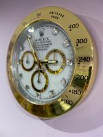 Rolex Daytona Wall Clock Series, Yellow gold bezel with white face.