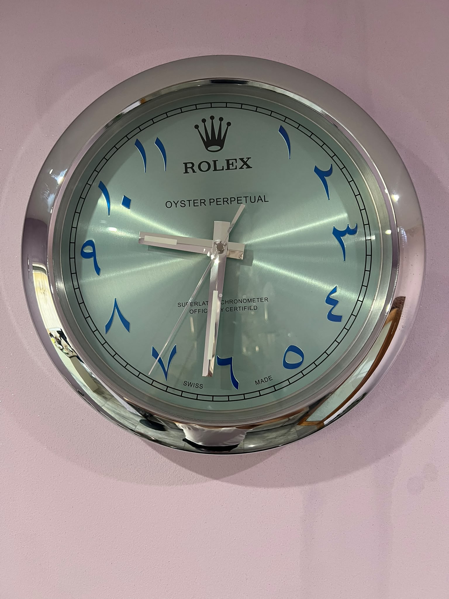 OYSTER PERPETUAL Wall Clock IN SILVER Crome stainless steel with black face. OYSTER PERPETUAL Wall Clock IN SILVER Crome stainless steel with black face.